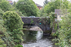
Jackson's Bridge is a large masonry bridge that carries Bethesda Street and formerly also carried the Dowlais Ironworks Tramroad, one of the earliest rack railways, over the river Taff. Built in 1791 by the Glamorganshire Canal Company, it is constructed in stone rubble and has a parapet with stone coping., June 2019