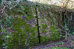 
The back wall of the Colliery with modern-day Springvale above it, January 2014