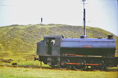 'Llewellyn' passing 'British' village, August 1973, © Photo by Richard Morgan, courtesy of Steve Thomas
