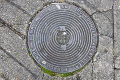 
'Henry Ward Williams, Ironfounder, Abertillery Monmouthshire' drain cover in Six Bells, December 2017