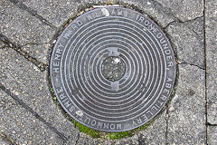 
'Henry Ward Williams, Ironfounder, Abertillery Monmouthshire' drain cover in Six Bells, December 2017