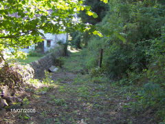 
The trackbed of the railway approaching the wireworks from the level crossing, Tintern, July 2005