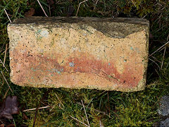 A brick found by Meadow Vein Level, the clay level for the upper brickworks, January 2025