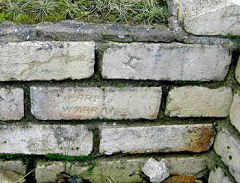 
The Engine House wall at Mine Slope Colliery, Upper Cwmbran. Several bricks are stamped 'PARFITT CWMBRAN', others stamped with an 'H'