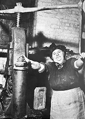 
Brynhelig brick press and its operator, Miss Maria Willstead