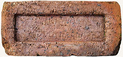 
'Bryn Port Talbot' from Bryn Brickworks © Photo courtesy of Mike Stokes who says 'Despite the fact there were hundreds of bricks lying around Bryn Brickworks when visited in October 2014, I struggled to find one with a 'Bryn' imprint. Eventually I found two in a stream some distance from the kiln, this is the better one but it's not a good example'.