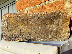 
'E &B Eagle' as far as can be read, from Eagle Brick Works, Cwmavon