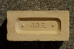 
'JCE' from J.C.Edwards, Ruabon, Denbighshire, on a yellow brick, © Photo courtesy of Martyn Fretwell