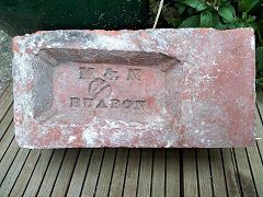 'M & N Ruabon' on a coping or lintel brick, Denbighshire © Photo courtesy of Tony Gray