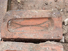 Cross mark on the reverse of 'Woodward & Co Cardigan' © Photo courtesy of Kevin Williams