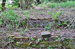 
Hancocks Wharf - the rail (centre) was for an interchange trolley which moved left to right to move the box wagons from the brickworks (which were loaded perpendicular to the wharf) at the higher level, to the standard gauge wagon (siding left to right at the bottom) doors for loading. Early containerisation, © Photo courtesy of Phil Pritchard