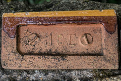 
'JCE' on a half-sized semi-glazed brick, J.C.Edwards, Ruabon, Wrexham