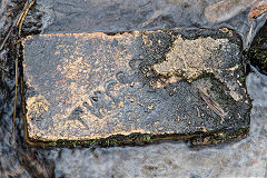 
'TW Co (Ltd)', probably from Pentyrch Brickworks as it was found at Gwaelod-y-Garth