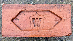
'W' in a shield, found at Splott, Cardiff, possibly 'Waring Brick Co', Newport Road, Cardiff. &copy; Photo courtesy of Phil Burgoyne
