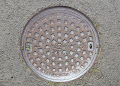 'Ham Baker & Co Ltd Keymac WVS Westminster SW', part of the 'Western Valleys Sewer' system, found at Cwm, August 2021
