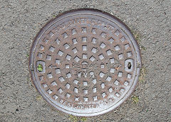 
'Ham Baker & Co Ltd Keymac WVS Westminster SW', part of the 'Western Valleys Sewer' system, found at Cwm, August 2021