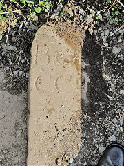 
'B&A C Co', a canal company stone at Llanfoist Wharf © Photo courtesy of Lawrence Skuse