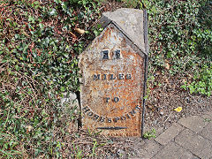 
'11 miles to Hobbs Point', Kilgetty, Pembrokeshire, but facing the wrong way, cast by 'Moss & Sons' from Carmarthen in 1838