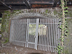 
Ty Mawr Lane bridge, railways over Ty Mawr Lane to the left, canal where the modern road is, towpath to the right, July 2022