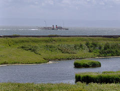 
'Waverley' steams past Aberthaw pebble Limekilns, June 2009