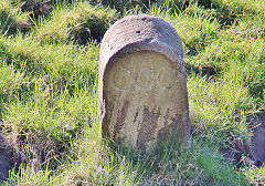 
SCC 'CCC' boundary stone at upper bridge near Midford, March 2022