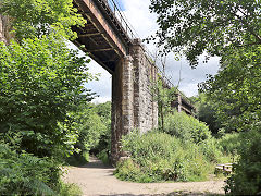 The lower tramway passing under the Newquay branch at Rock Mill Viaduct, Trevanney, June 2023