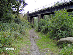 The lower tramway passing under the Newquay branch at Rock Mill Viaduct, Trevanney, October 2005