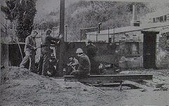 Re-erectng the Guinness hoist, 1976, © Photo courtesy of 'Brockham Museum News' and DH Smith