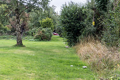 
The course of the Snailbeach Railway main line at the back of the village hall, the site of the Lower Works, September 2018