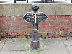 Rochdale Canal milepost at the exit lock, Manchester, March 2025