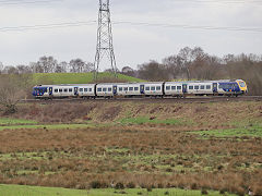 '195 110' passes Castleton, Rochdale, Manchester, February 2024