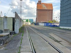 
Trackwork in Stralsund Harbour, with '293 022' in the distance, September 2024