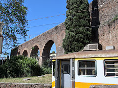 Centocelle Railway '069' and the aqueduct at Porta Maggiore, Rome, May 2022