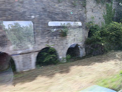 
A large bank of limekilns at Berzee, South of Charleroi, Belgium, taken at speed from the train, June 2024